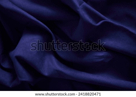    violet  material backhround with deep shadows                    