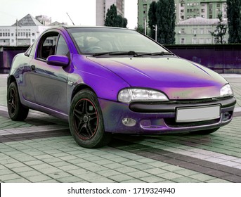 violet small sportcar with closed doors