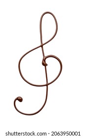 Violin clef made of melted chocolate on white background