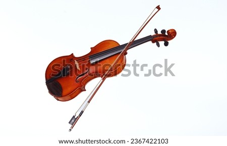 Violin: A four-stringed instrument played with a bow, producing a high-pitched, melodic sound.