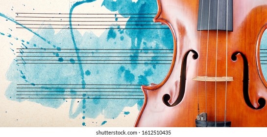 Violin and notes. Melody concept. Photo of old music sheet in blue watercolor paint. Classical music concept. Abstract blue watercolor background. Violin close up. copy spaces