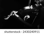 Violin player. Violinist hands playing violin classical music instrument close up