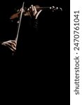 Violin player. Violinist hands playing concert isolated on black background