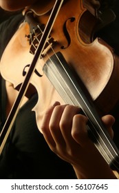 Violin Player Violinist Musical Instrument Orchestra Symphony. Classical Music Violin Close Up Strings