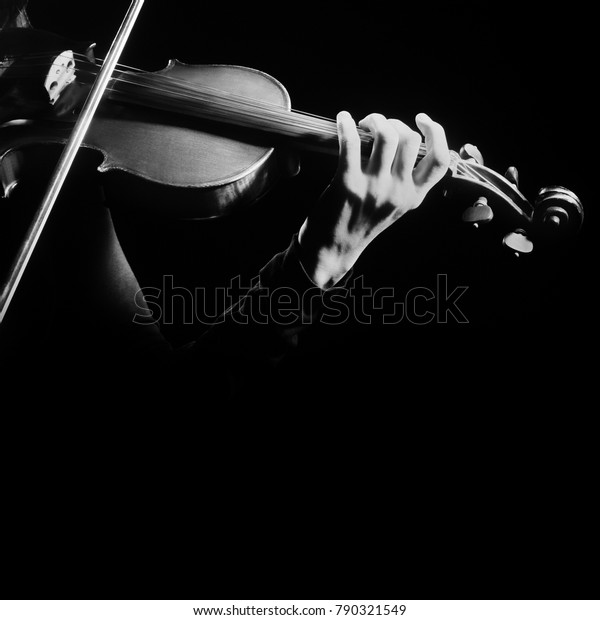 Violin player. Violinist playing violin hands\
close up music\
instrument