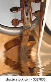 violon with drum with water reflection effect