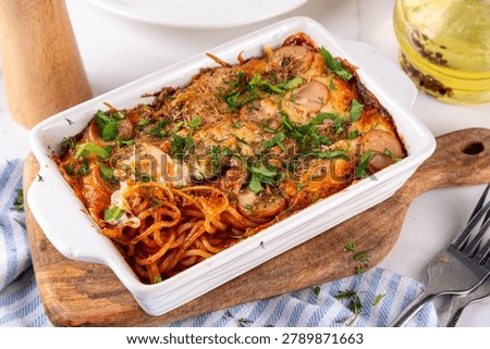 Viral Baked Spaghetti, Pizza Styled baked spaghetti pasta casserole with tomato marinara sauce, cheese puff and ham sausages