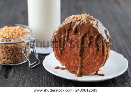 Viral Dessert New York Roll Croissant Bomboloni Cromboloni with Chocolate Sauce and Chopped Peanut Topping 
