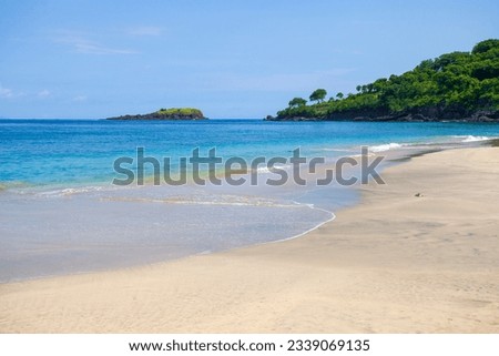 Virgin Beach or Pantai Pasir Putih (white sand beach) in Karangasem Regency, East Bali, Indonesia with beautiful white sand and calm turquoise coloured water.
