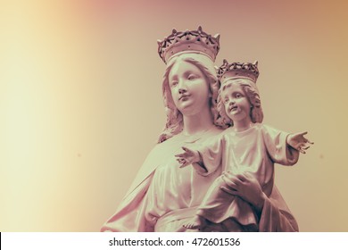 Virgin Mary and baby Jesus  ( Filtered image processed vintage effect. )