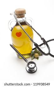 virgin olive oil with stethoscope and heart