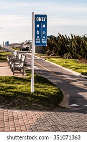 Virginia Beach Oceanfront Boardwalk Bike Path With Benches.