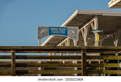 Virginia Beach,Virginia,USA-May 31, 2021: Virginia Beach Fishing Pier's Sign near Virginia Beach Boardwalk in summer.