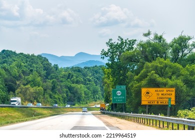 Virginia interstate highway 81 road with traffic cars trucks in summer, scenic view of Blue ridge mountains in Botetourt county, Arcadia town village