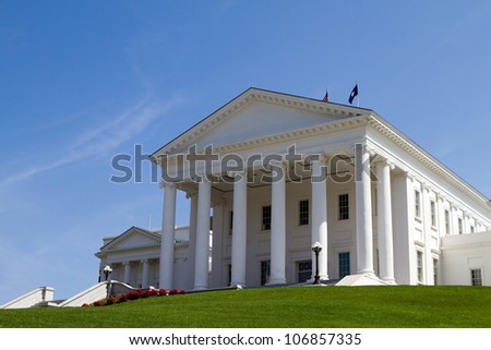 Virginia Statehouse building in Richmond, Virginia, USA against a blue sky background.