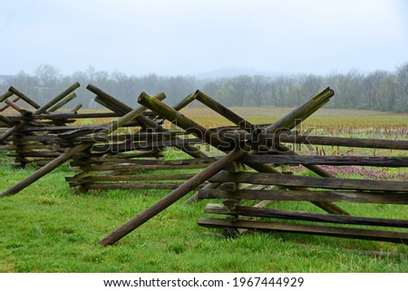  virginia worm wooden fence  in the historic  gettysburg battlefield along chambersburg road on a cloudy day in spring in pennsylvania
