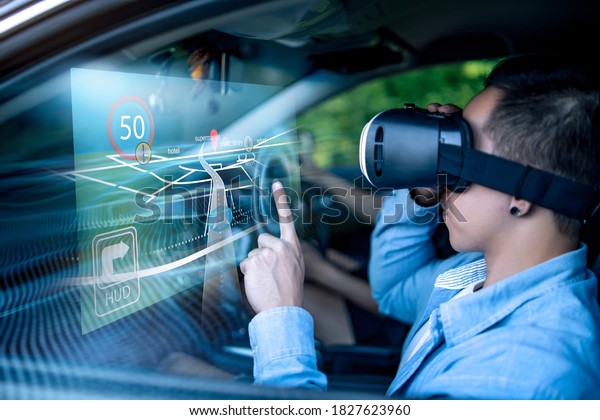 Virtual augmented reality driving user\
interface simulation projection holographical information display\
screen navigation man in car wearing vr headset interacting\
interface pointing finger\
selection