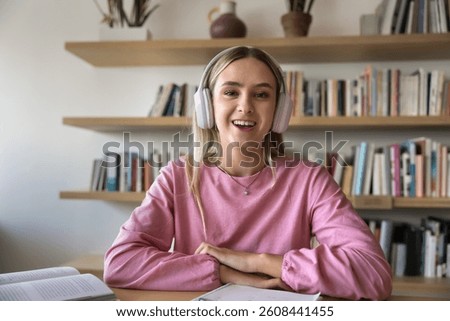 Virtual classroom. Webcam screen view portrait happy confident young female student wear digital earphones communicate with mentor mates by video call answer teacher question at remote lesson seminar