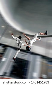 Virtual. Indoor Skydiving In Wind Tunnel. People Fly Like In Virtual World