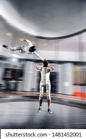 Virtual. Indoor Skydiving In Wind Tunnel. People Fly Like In Virtual World