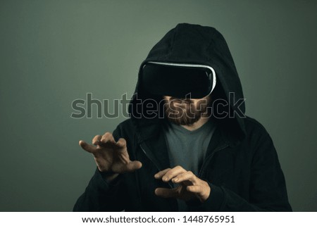 Virtual keybord hacker. Internet security concept. Man with hoodie