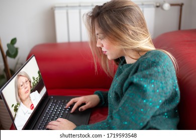 Virtual live chat with the patient with digital tablet and a doctor via internet. In-home care for a young female patient in telemedicine or telehealth, coronavirus covid-19 related
