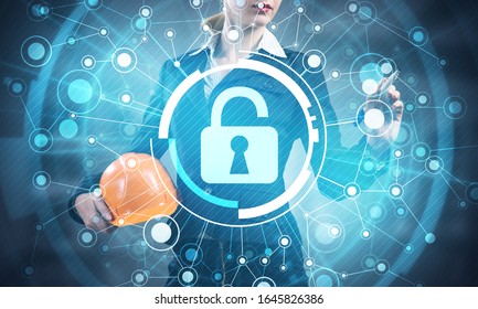 Virtual locking mechanism to access shared resources. Businesswoman pointing on padlock hologram. Internet concept for identity and access management. Future cyber technology web services for business