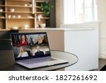 Virtual meeting team teleworking. Family video call remote conference. Laptop webcam screen view. Diverse portrait headshots meet working from their home offices. Happy hour party online