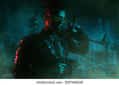 Virtual Reality, City Of The Future. A Tech Cyber Warrior Fights With Automatic Guns In His Hands Against The Backdrop Of The Night City.