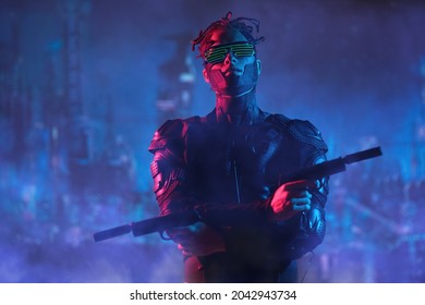 Virtual Reality, City Of The Future. A Tech Cyber Warrior Fights With Automatic Guns In His Hands Against The Backdrop Of The Night City.