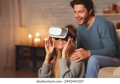 Virtual Reality. Excited Couple Using VR Glasses Playing Videogame Having Fun Sitting On Floor At Home - Powered by Shutterstock