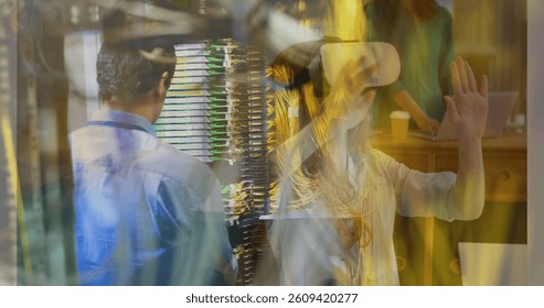 Virtual reality experience over people working with servers and computers in office. Technology, innovation, VR, teamwork, collaboration, network