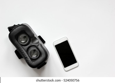 virtual reality glasses with smartphone on white background