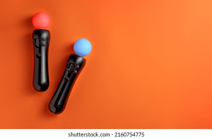 Virtual reality move controller on orange background