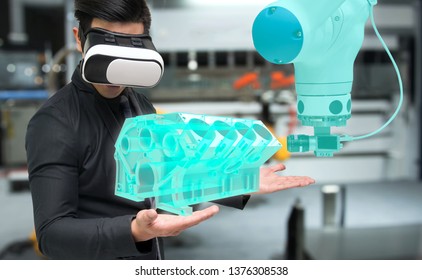 Virtual Reality Technology In Industry 4.0. Business Man Suit Wearing VR Glasses To See AR Service , Machine Camera Vision Of Smart Robot Arm Machine In Smart Factory. 