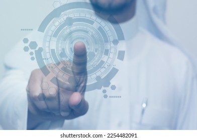 Virtual screen of Saudi man indicates with his finger. E services touch screen with correct choice  - Shutterstock ID 2254482091