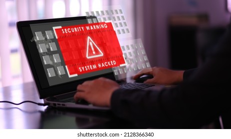 Virtual security warning system hacked alert on laptop screen. Cybersecurity vulnerability on internet, virus, data breach, malicious connection. Selective focus.