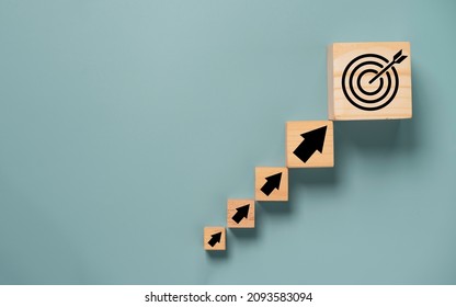 Virtual target board and arrow which print screen on wooden cube. Business achievement goal and objective target concept. - Shutterstock ID 2093583094