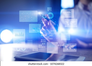 Virtual touch screen. Project management. Data analysis. Hitech technology solutions for business. Development. Icons and graphs background.  Internet and technology.