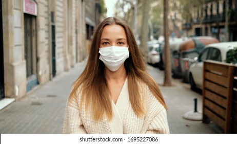 Virus mask spanish woman on street wearing face protection in prevention for coronavirus covid 19. Lady walking in public space on quarantine for food