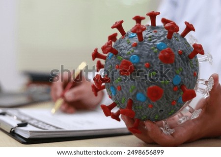 A virus is a microscopic infectious agent that replicates inside living cells, causing diseases. Composed of genetic material and a protein coat, viruses can infect animals, plants, and bacteria.