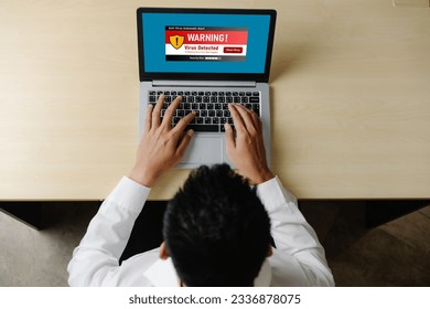 Virus warning alert on computer screen detected modish cyber threat , hacker, computer virus and malware
