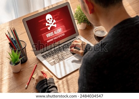 Virus warning alert on computer screen detected modish cyber threat , hacker, computer virus and malware
