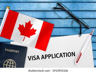 Visa application form and flag of Canada