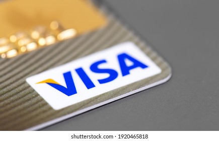 Visa plastic electronic, credit card closeup, logo macro. Visa - American multinational company providing services of payment operations. Moscow, Russia - January 18, 2021