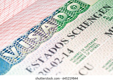 Visa schengen. Spanish visa vignette in passport. Macro image, selective focus - Shutterstock ID 645219844