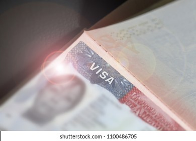 Visa Stamp Travel Passport Immigration Macro Emigration. Close Up Of Text VISA On USA Visa Stamp In Passport. A Visitor Needs A Valid US Visa To Present To The CBP Officer . 