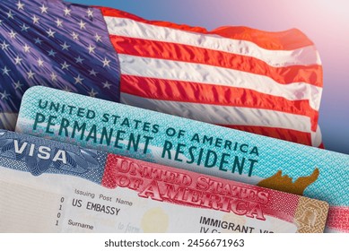 VISA United States of America. Green Card US Permanent resident. Work and Travel ID documents. US Immigrant.  Visa for Immigration. Embassy USA. Visa in passport. American flag on background
