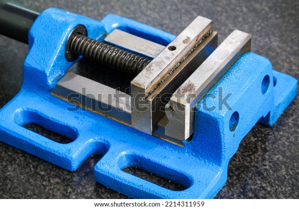 Vise - a bench or carpentry tool for fixing parts\
for various types of processing (sawing, drilling, planing,\
etc.),mounted vise grip