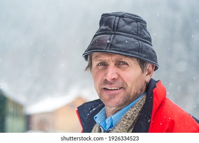 Viseu de Sus, Maramures, Romania - January 17 2016: Portrait of a man from North Romania, worker at forestry railway